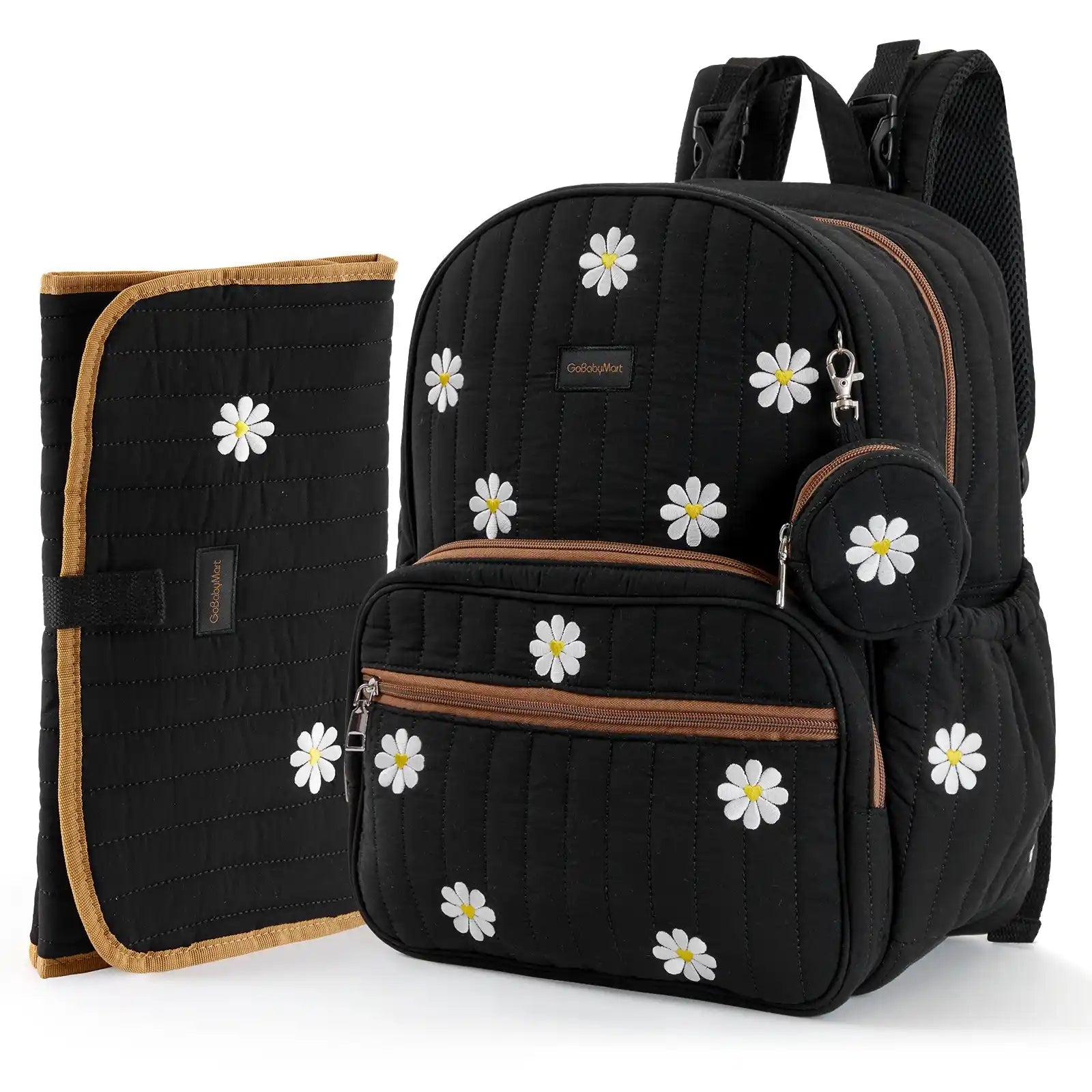 Black quilted Diaper Bag backpack set with a matching zippered pouch and a matching quilted changing pad or mat, both decorated with white daisy flowers and brown trim, shown on a white background. #Color_Black - Flowers