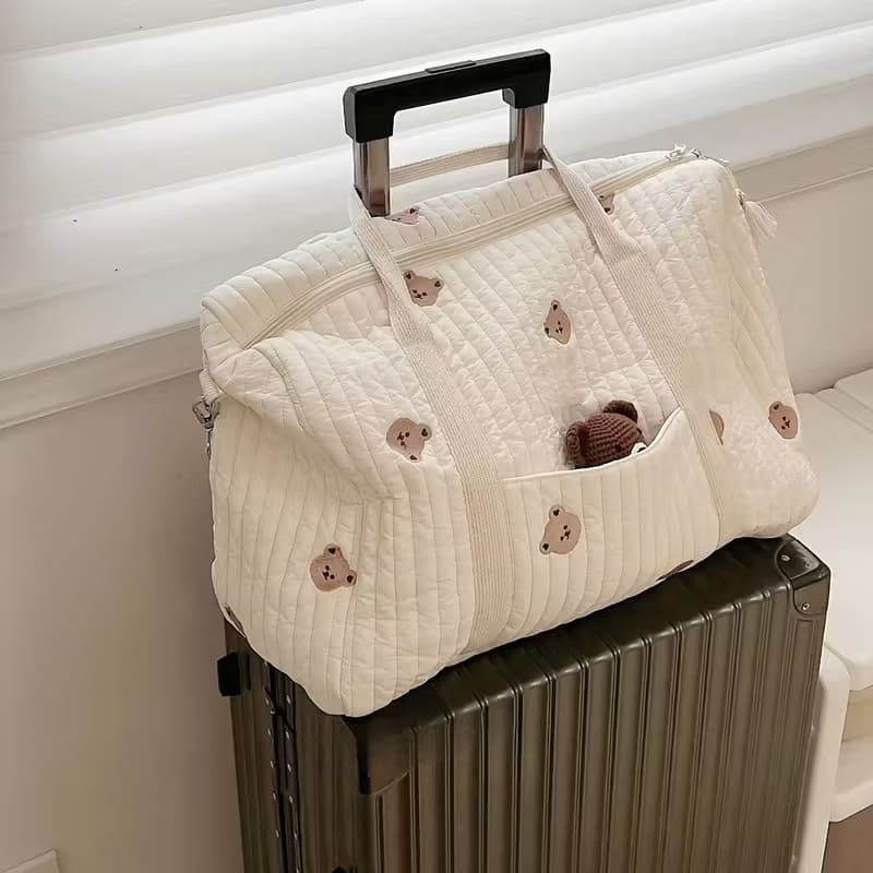 Diaper bag tote on luggage beige 