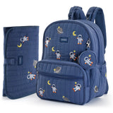 A navy blue quilted diaper bag backpack set with matching pouches, featuring a playful astronaut and space-themed print. The set includes a main backpack, a front zippered pocket, a side mesh pocket with a matching coin pouch, and a separate matching diaper cover shown to the left, all on a clean white background. #Color_Navy - Astronauts