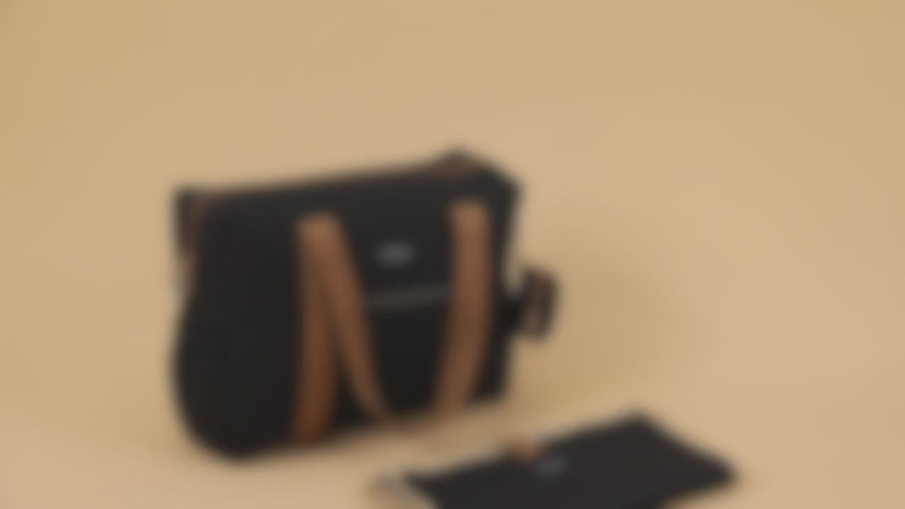 Black quilted diaper bag tote by GoBabyMart with stroller straps