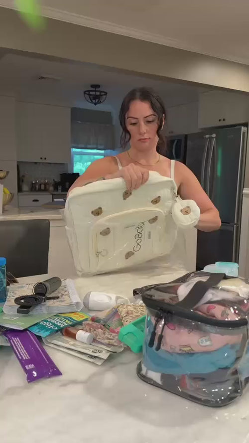 Real mom demonstrating the GoBabyMart diaper bag backpack and its everyday storage and organization features.
