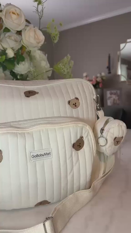 Mom showing how she packs baby essentials in the GoBabyMart diaper bag backpack for everyday outings.